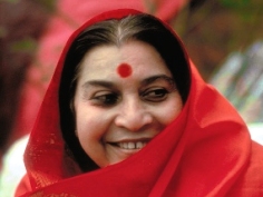 Shri Mataji in red shawl